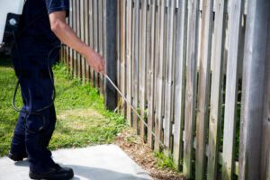 Pest Control Worker Spraying Pesticide